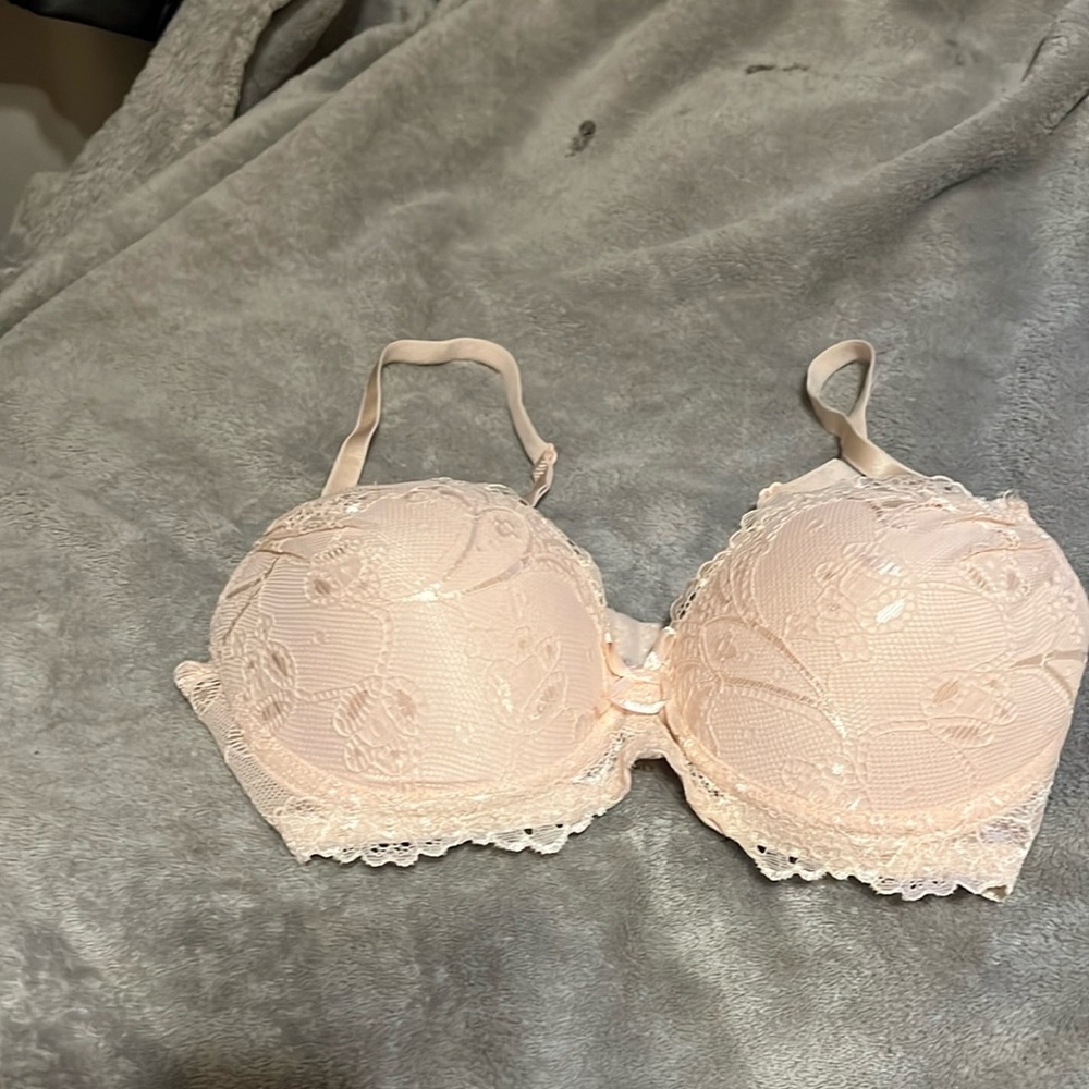 Blush pink lacy push up bra.